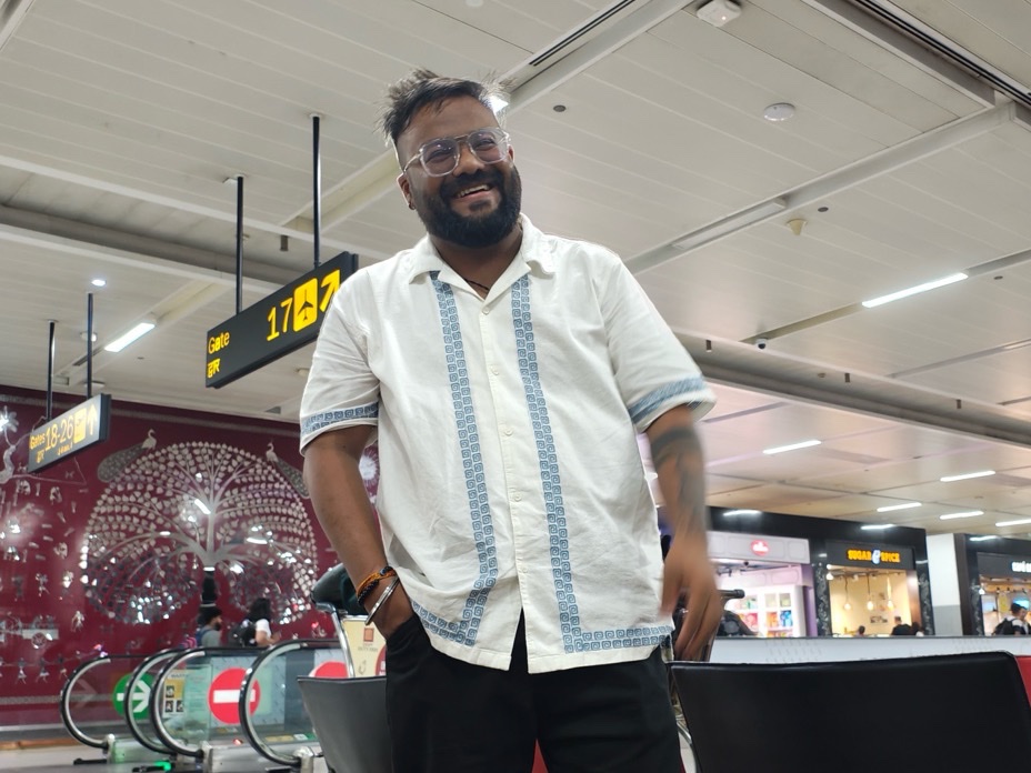 Abhishek smiling at the departure gate before his flight to Ireland